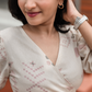 Puffy Poise Beige Cotton Blend Wrap Dress with V-Neckline & Puff Sleeves