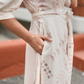 Puffy Poise Beige Cotton Blend Wrap Dress with V-Neckline & Puff Sleeves